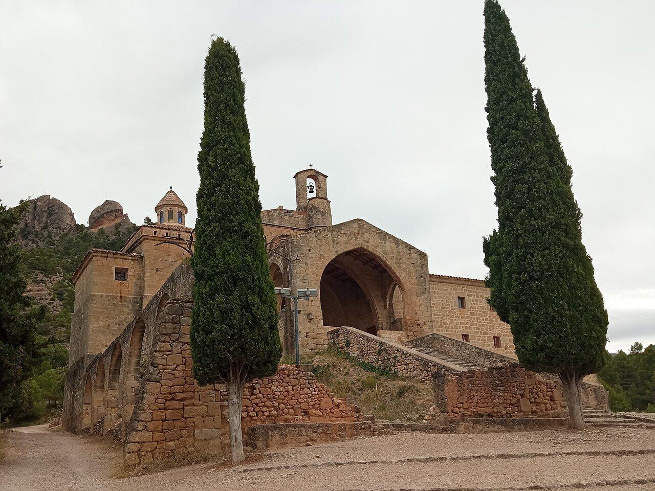 Cypress trees framing the entrance to the Sant Salvador convent near Horta